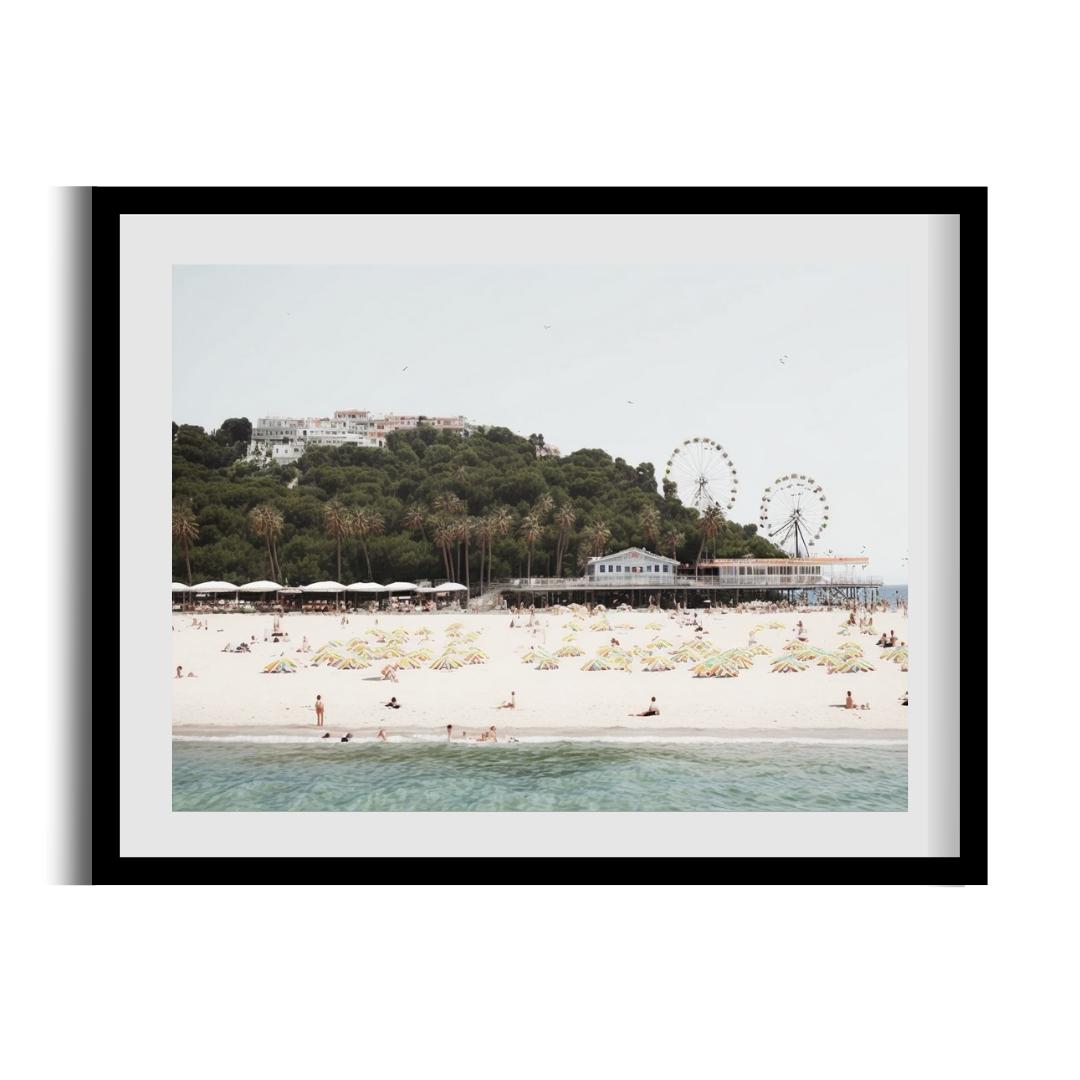 FASart, Coastal Harmony: Buildings, Beach, and Calm Waves Amidst Green Hills